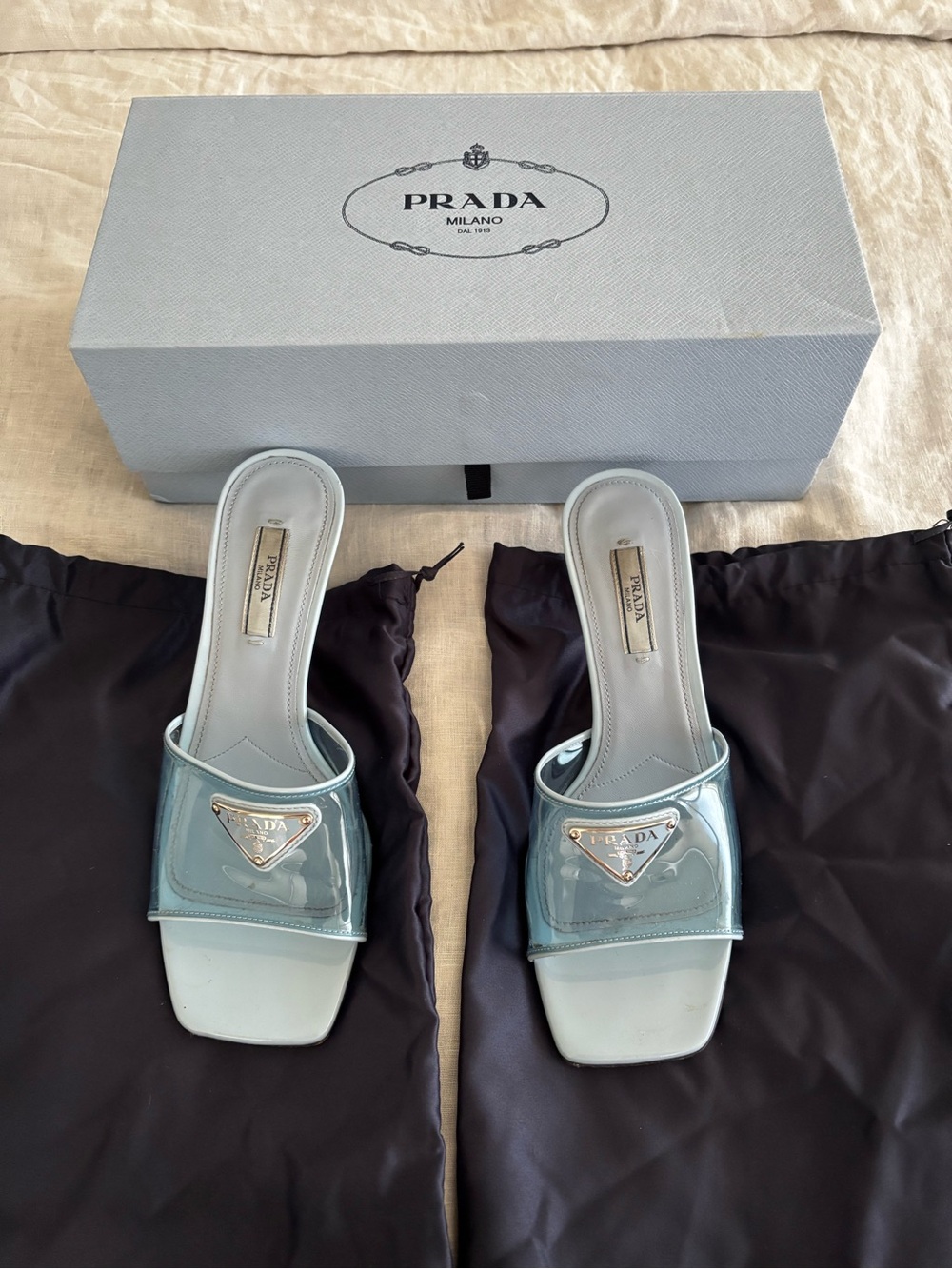 Prada Light Blue Patent Slide Sandals with Silver Logo Plaque